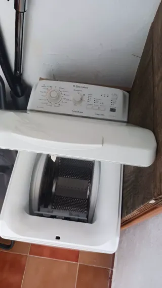 Lavadora blanca carga superior