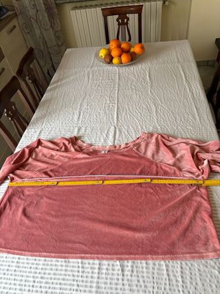 Tuta in ciniglia rosa