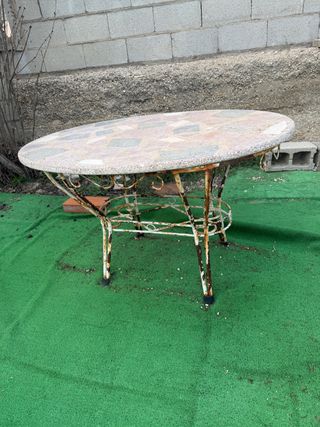 Mesa de jardín ovalada de piedra