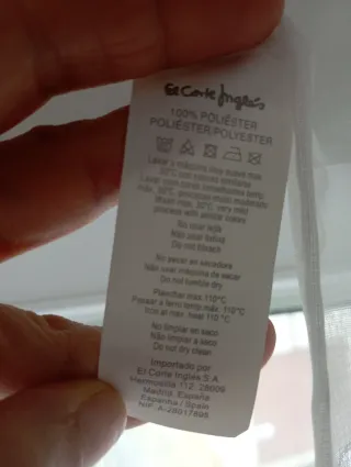 Cortinas blancas con topos