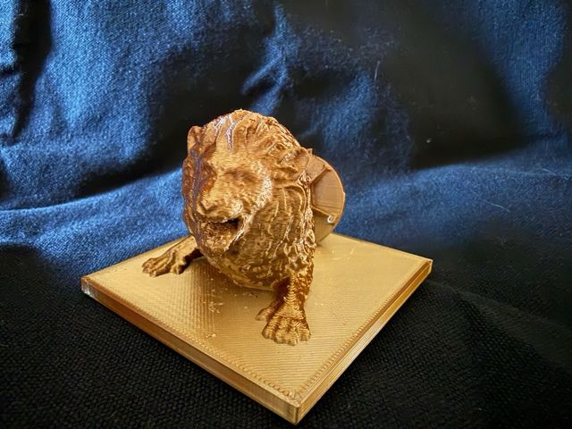 León 3D saliendo de alcantarilla