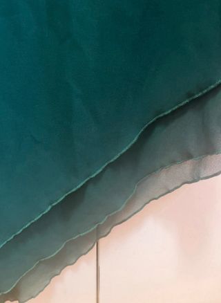 Blusa elegante verde con lazo