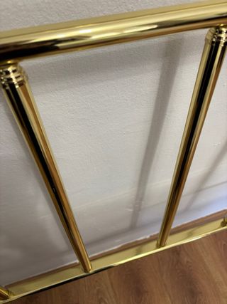 Cabecero de cama metálico dorado