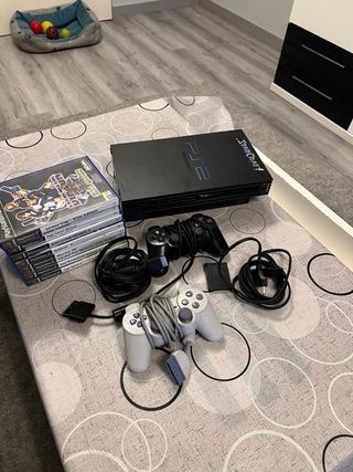 Console PS2 Nera + 5 Giochi