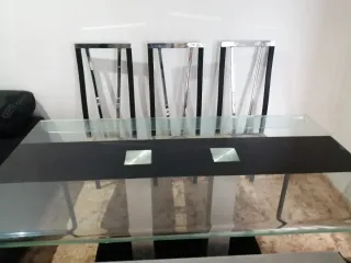 Mesa de comedor de cristal y 6 sillas