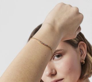 Pulsera Tous baño oro 18kt plata gemas