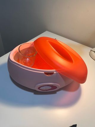 Calentador de parafina rosa y naranja