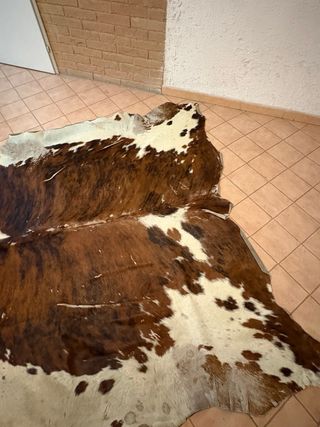 Tappeto in pelle maculato