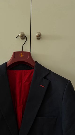 Americana El Ganso azul forro rojo