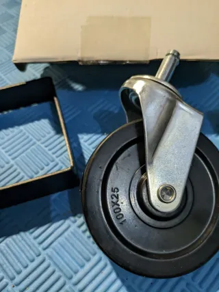 Ruedas (x2) giratorias con resorte para puerta.