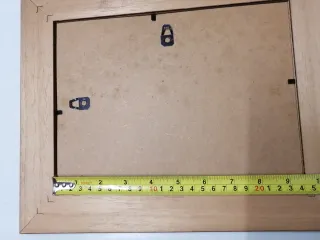 Cornice in legno con vetro