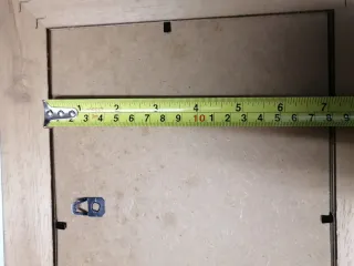 Cornice in legno con vetro