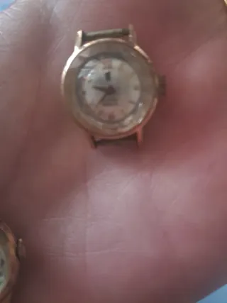 Dos Cajas de Relojes Dorados