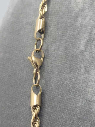 Colgante Nefertiti Baño Oro Acero Quirúrgico