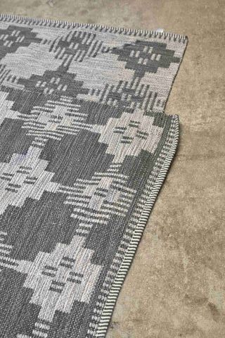 Tappeto Kave Home in poliestere grigio