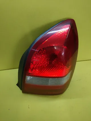 PILOTO TRASERO DERECHO NISSAN PRIMERA P12 4P