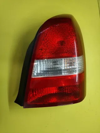 PILOTO TRASERO DERECHO NISSAN PRIMERA P12 4P