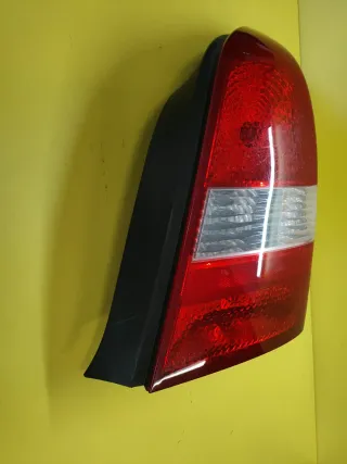 PILOTO TRASERO DERECHO NISSAN PRIMERA P12 4P