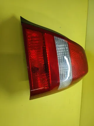 PILOTO TRASERO DERECHO NISSAN PRIMERA P12 4P