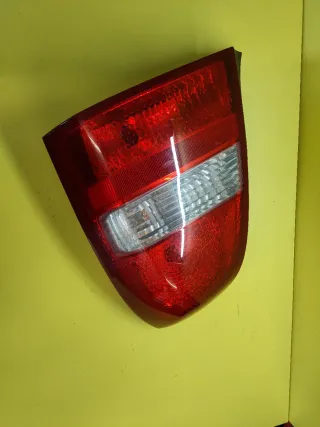 PILOTO TRASERO DERECHO NISSAN PRIMERA P12 4P