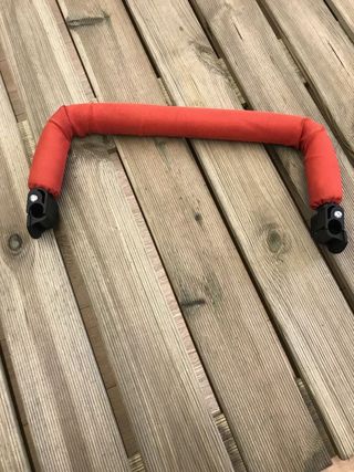 Barra para silla de paseo color naranja