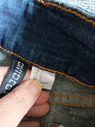 Lote de falda XS de H&M y camiseta S escote barco