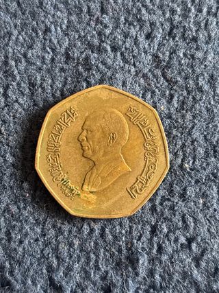 Moneda antigua con retrato