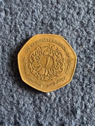 Moneda antigua con retrato