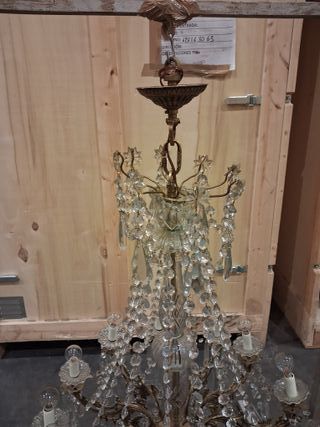 Lámpara de lágrimas dorada y transparente