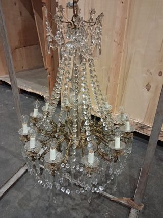 Lámpara de lágrimas dorada y transparente