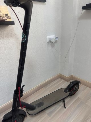 Patinete eléctrico negro ,venta personal y directa