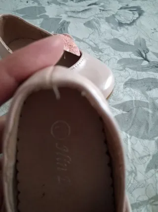 Zapatillas niña lazo brillante rosa