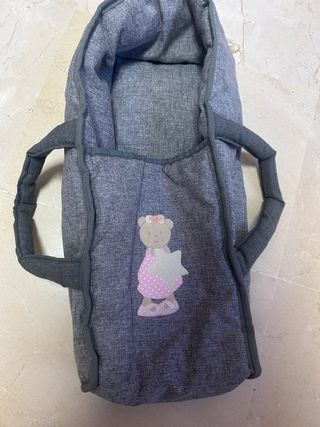 Carro de muñeca gris con lazo