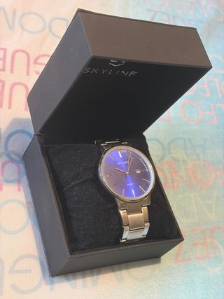 Reloj Skyline Azul y Plateado