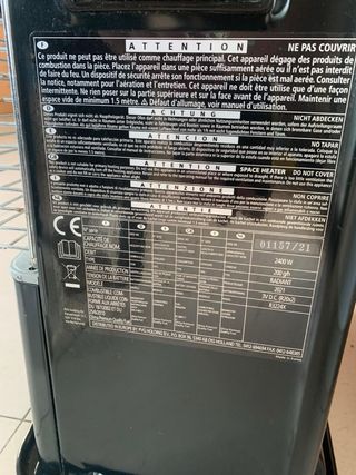 Estufa de Parafina Qlima Negra y Plateada