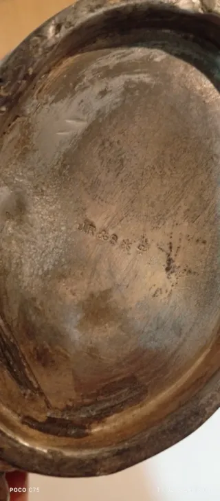 Tetera antigua plateada