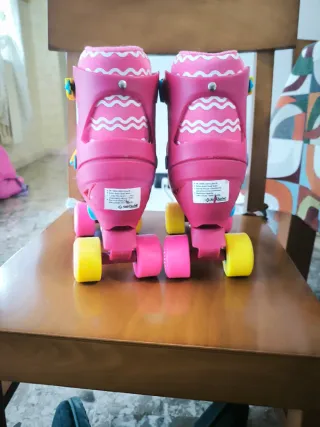 Pattini a rotelle 4 ruote rosa