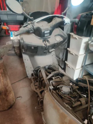 Kymco 500 carburación Maxi Scooter. Para reparar