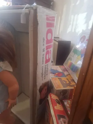 Muñeca antigua con vestido azul