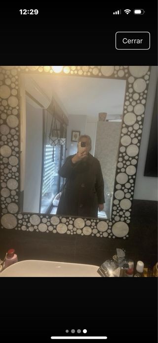 Abrigo hecho a mano por una modista gris, elegante