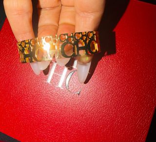 Pulsera Carolina Herrera Dorada