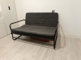 Sofá cama gris y negro