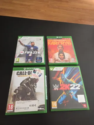 Xbox One X con 2 mandos y 4 juegos