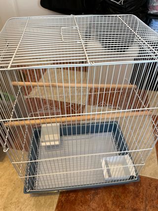 Jaula para pájaros blanca y azul