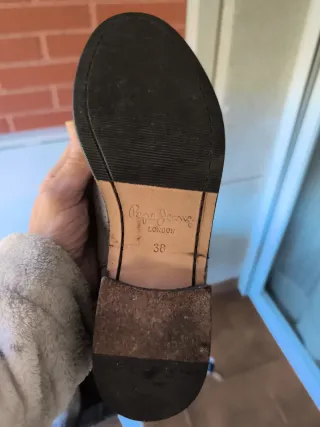 Botas Pepe Jeans planas caña alta de piel.