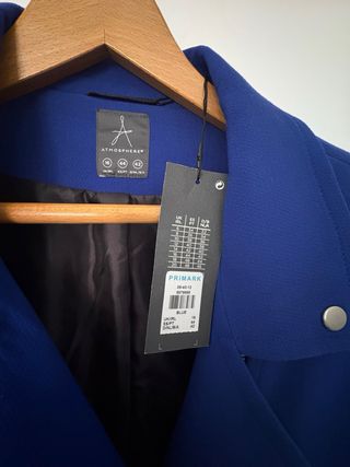 Abrigo azul , sin estrenar ,con etiqueta..