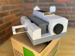 Proyector de diapositivas Cabin 1000A