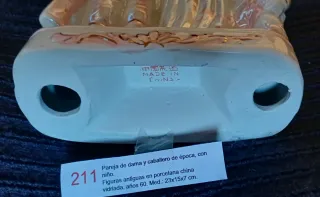 Figuras porcelana época pareja y niño