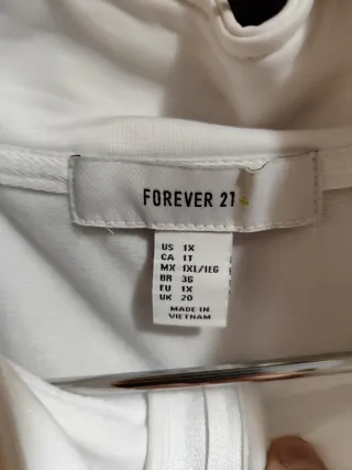 Chaqueta deportiva blanca con rayas