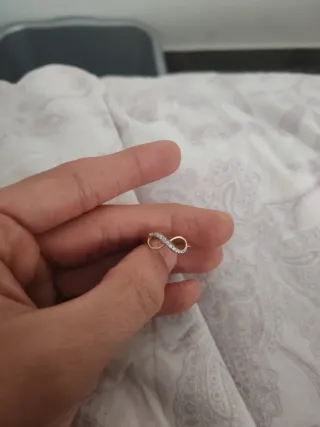 Anillo infinito oro 9k con circonitas
